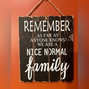 Decorative sign “normal family”